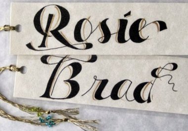 write the 2 names of your choice in beautiful calligraphy and make 2 laminated bookmarks big2