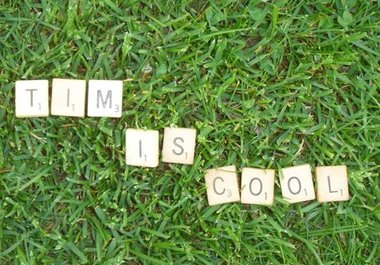 arrange Scrabble tiles to form a message lush, green grass and send you a high res photo big2