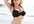 daNCE in a Hot Bikini by holding a sign