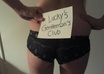 hold a sign in booty shorts