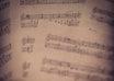 compose and record a 2min piano song for your child