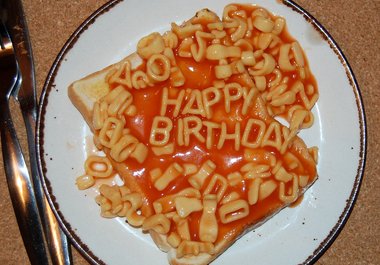 write the message of your choice in alphabetti spaghetti on toast,  photograph it and email you the jpg image for you to use as you wish big1