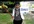 record a HD quality video of a girl holding your signage in an innovative style