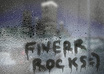 write your text, message or logo on a wet window pane with raindrops