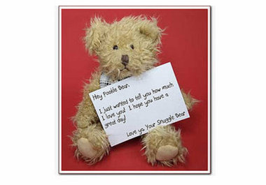 have my teddy bear hold a sign with your message big1