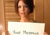 get a beautiful girl to hold a sign with your name or message