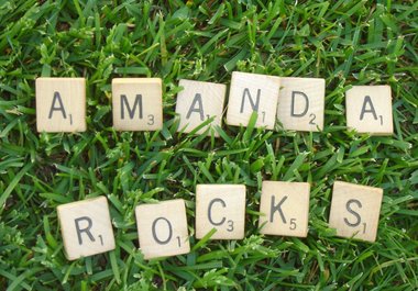 arrange Scrabble tiles to form a message lush, green grass and send you a high res photo big1