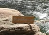 write your message on a sign by a swift river and take a high resolution photo small1