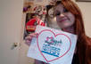 take a picture holding a sign saying something that you choose