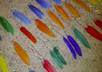 create a pair of long feather earrings in a bright color