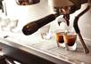 create a video of espresso being poured into a cup with your name or site on it