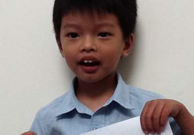 take a picture of my cute kid holding up your sign big1
