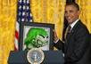 make President Obama shows your picture to the press small1