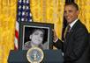 show President Obama holding your photo or logo just
