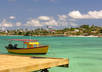 answer 5 questions about Aruba in detail
