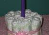 create a diaper candle centerpiece