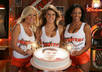 create the illusion that the Hooters girls are celebrating your birthday